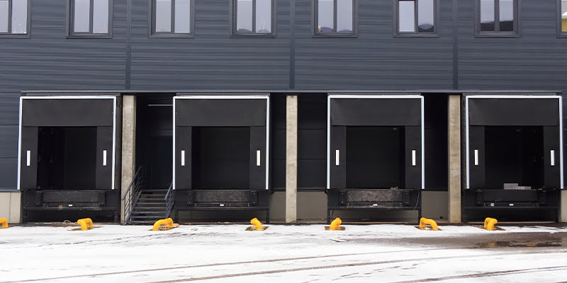 Sectional doors in loading docks