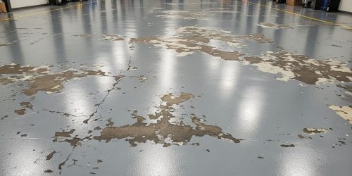 Epoxy floor in poor condition 2