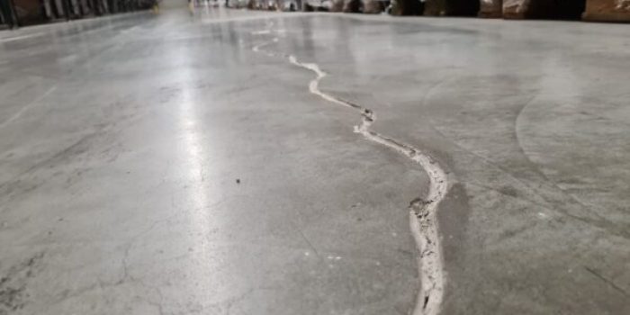 Long-crack-in-the-concrete-floor.jpeg