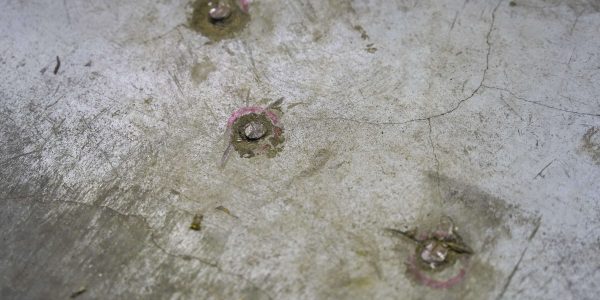 anclajes estanterias suelo