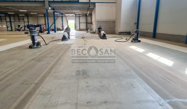 concrete removal in industrial building with satellite sanding machine