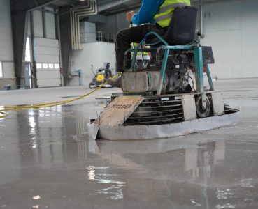grinding floor with power trowel
