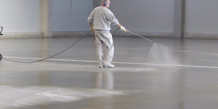 protective sealer apllying protective sealer to concrete floor